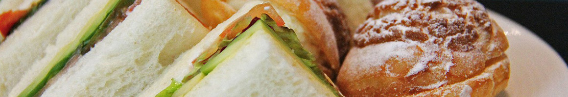 Eating American (New) Fast Food Sandwich at Louie K Subs / Club Sandwich restaurant in Sunrise, FL.